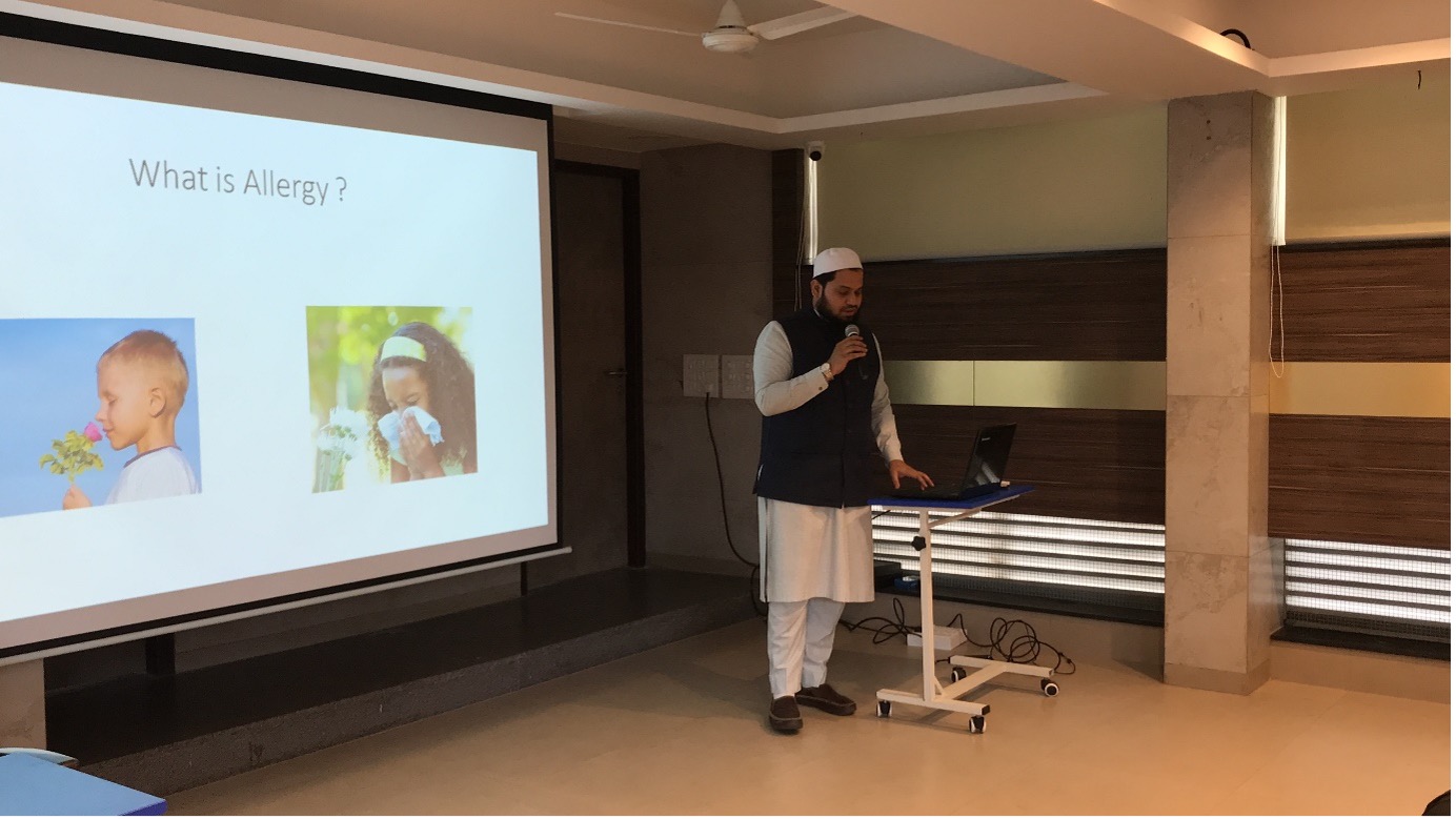 Dr. Saud Ahmed conducting a public allergy awareness session