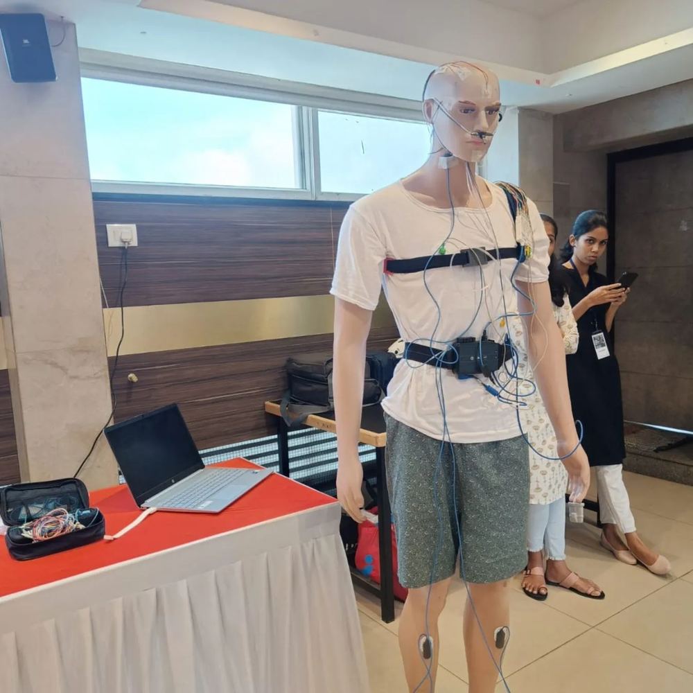 Sleep study equipment on display at a medical conference exhibition